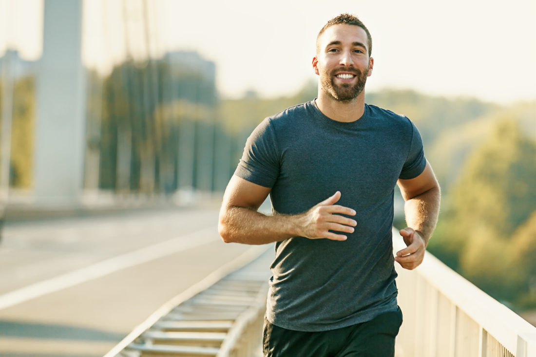 Young Fitness Man Exercising. Living Healthy Lifestyle.