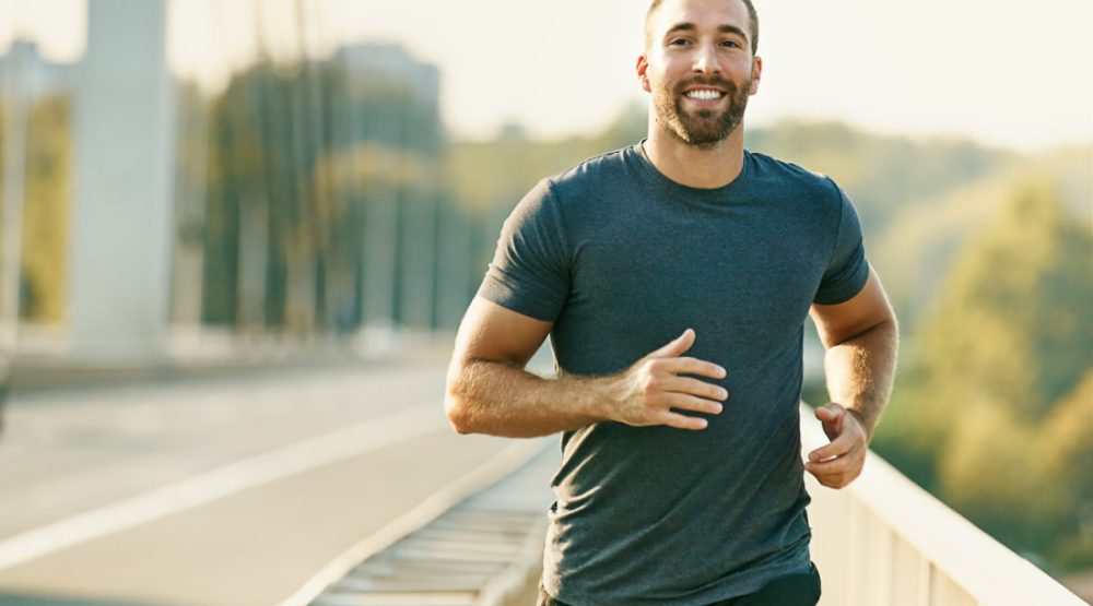 Young Fitness Man Exercising. Living Healthy Lifestyle.
