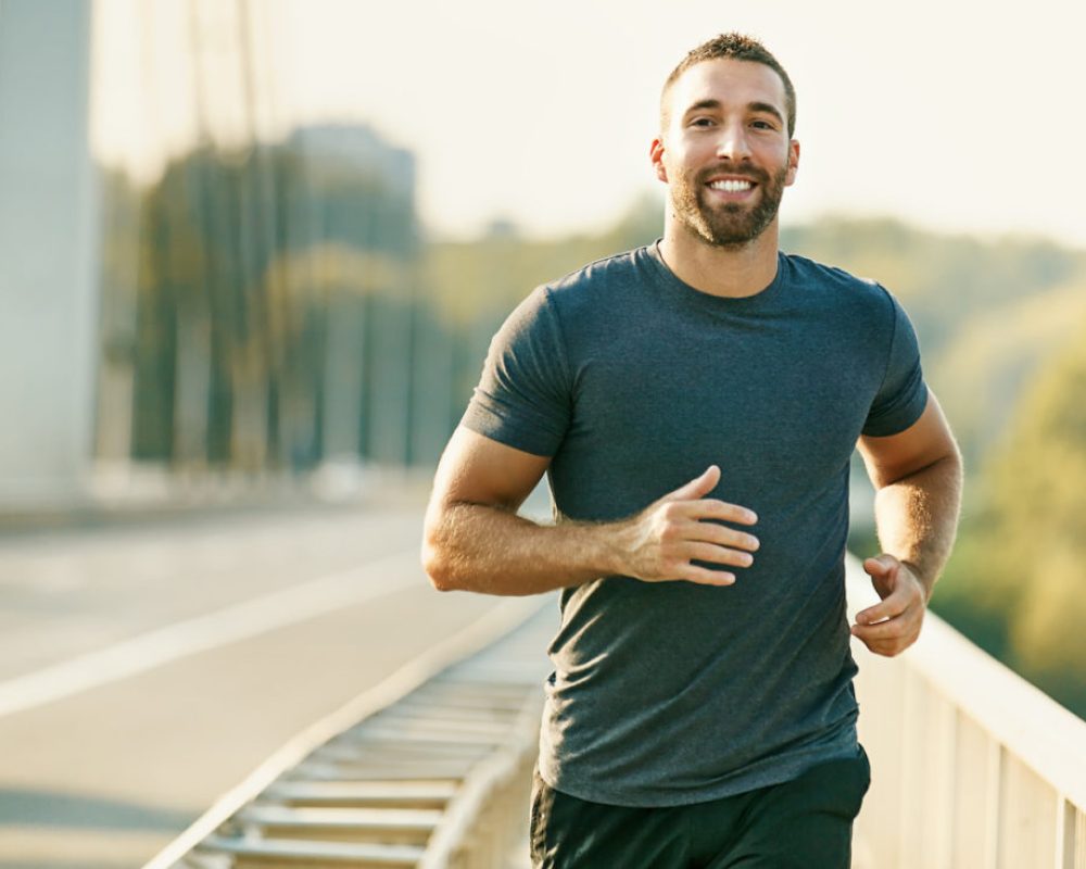 Young Fitness Man Exercising. Living Healthy Lifestyle. Young Fitness Man Exercising. Living Healthy Lifestyle.